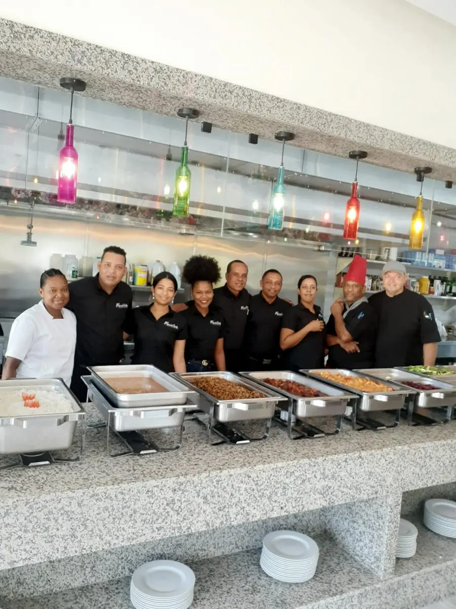 The staff team of Mamiii Chula restaurant in Playa Palmera